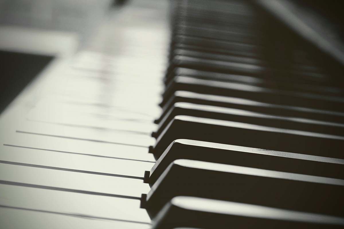 piano selective photography of piano grand piano